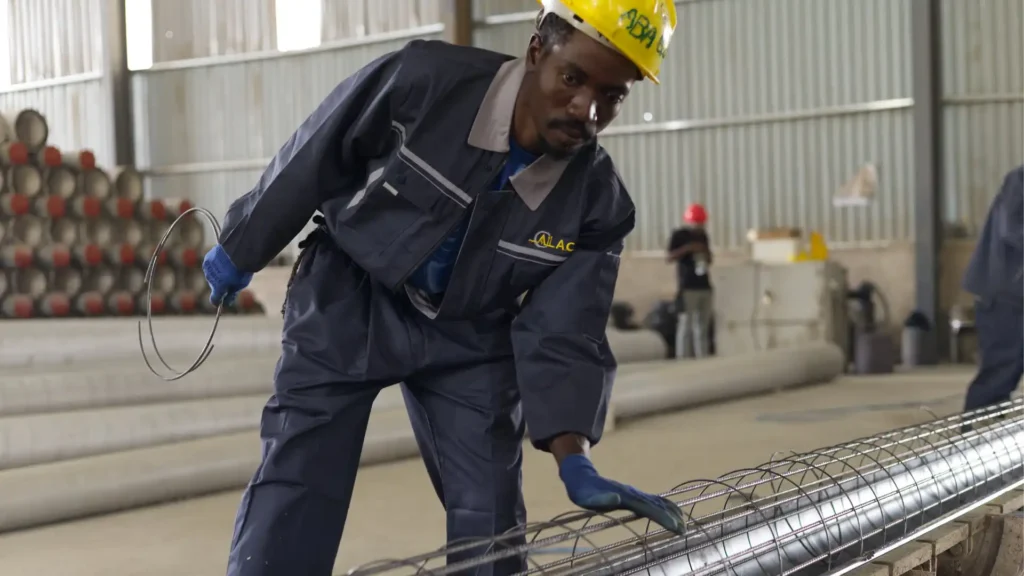 High-tensile prestressed steel cage assembly at ACIL production hub.