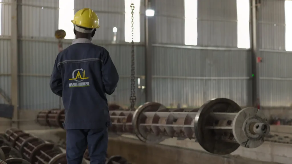 Heavy-duty steel molds preparation line for concrete electrical poles manufacturing.