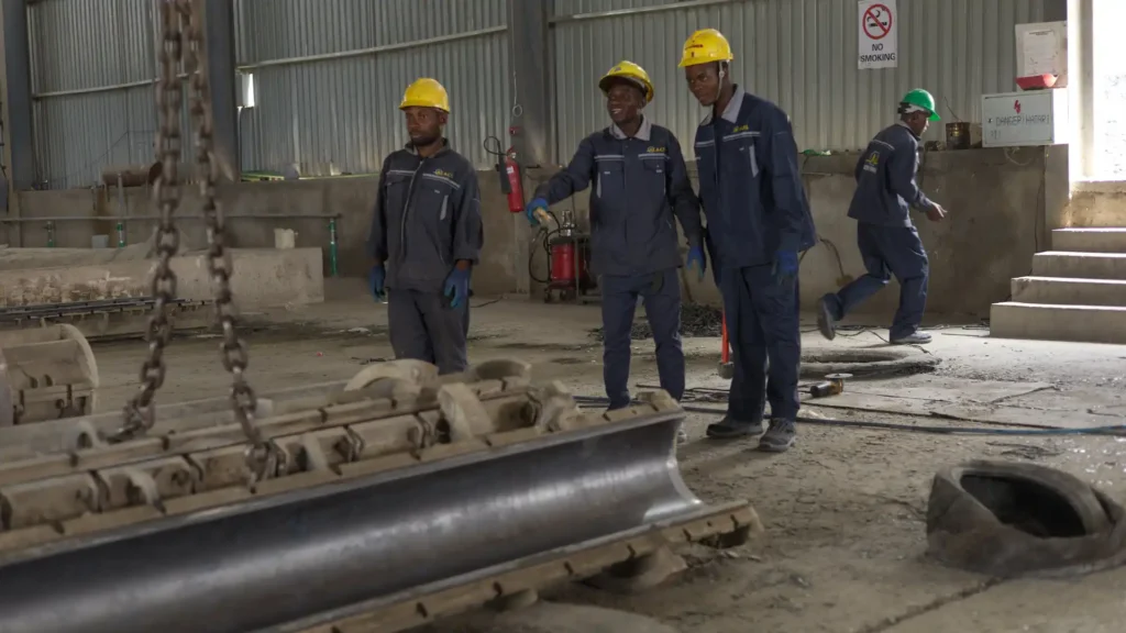 Heavy-duty steel molds preparation line for concrete electrical poles manufacturing.