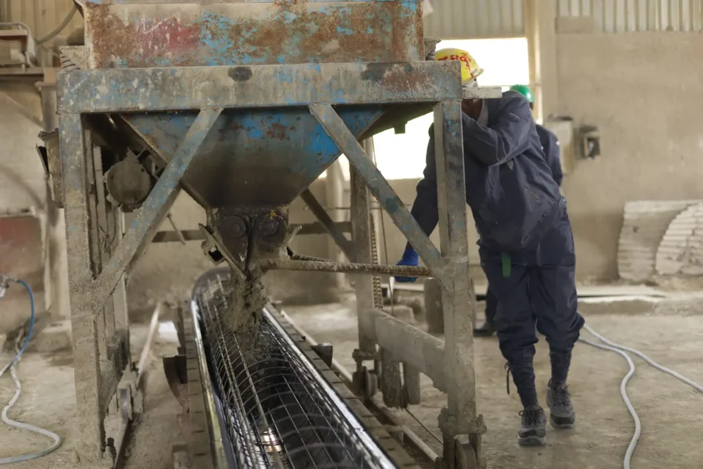 Precision concrete filling process for high-density infrastructure components.